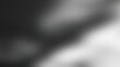 © Baby - Abstract textured background with a gradient of dark gray to bright white suggesting light and shadow play