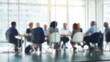 © annebel146 - Group of businesspeople negotiating gathered in modern conference room, blurred silhouettes view, meeting behind closed glass doors. Business communication, workflow, decision-making, strategy sharing