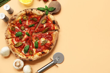 Wall Mural - Composition with tasty pizza, ingredients and cutter on beige background