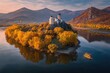 © Zahidah - Autumnal castle island reflected on a still river