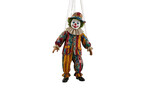 Colorful vintage clown marionette puppet hanging with strings on the transparent background, classic toy with painted face and costume