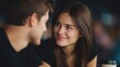 © KKC Studio - Young Couple Sharing a Joyful Moment in Casual Coffee Shop Setting