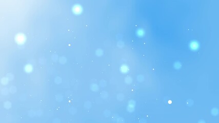 Light blue background with many bokeh style light spots. Suitable for digital backgrounds, web design, presentations, and creative projects.