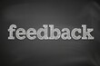 © MILE - Feedback Chalkboard Illustration with Textured White Letters for Business and Communication Concepts Perfect for Presentations and User Reviews