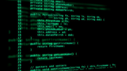 Glowing Green Computer Code on a Dark Blurred Background programming software