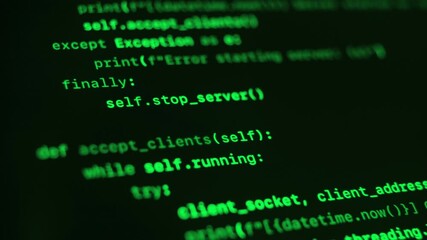Close up of black screen with green programming code. Cybersecurity or hacking concept
