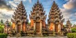 © chokdeelaw - Ancient gates with intricate carvings and ornate details leading to a majestic Hindu temple in Bali Indonesia