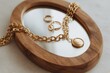 © Sulton - Golden treasures reflection: Glimmering collection of elegant jewelry gracefully arranged on a vintage mirror. It captures the artistry of luxury and opulence.