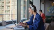 © stockbusters - Headphones hipster typing laptop in urban cafeteria closeup. Smiling woman