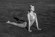 © Yevhen - Meditation in morning. Fitness lady outdoors, yoga stretching exercises. Black and white