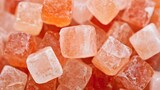 Close up shot of himalayan pink salt cubes with a soft focus and shallow depth of field