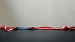 © aliececome - Vintage American flag border on a dark surface, minimalist patriotic decor with soft natural lighting.