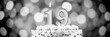 © Georg - Celebrating a 19th birthday with a cake and candles