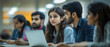 © COK House - A group of students working on laptops in a modern classroom, reflecting the educational process and teamwork.Useful for materials about education, student life, and technology in learning.