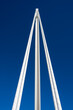White bridge pylon and the blue sky in the background