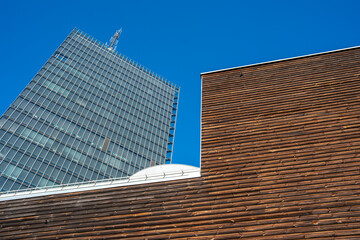 Contrast of wood and glass in Stockholm modern architecture, Scandinavian urban perspective showing geometry, light, clarity and background copy space for templates, posters and graphic design