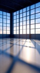 Wall Mural - Modern interior of a spacious room with large windows showcasing a sunset and long shadows on the floor