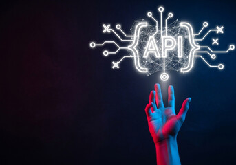 A hand interacting with a glowing API icon with a robotic brain, perfect for API integration, artificial intelligence, and software development