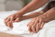 © Pixel-Shot - Young couple having sex on bed, closeup
