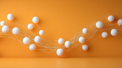 White spheres suspended by thin lines against an orange background.