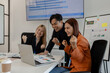 © Chadaporn - the group of business people showed their joy by clapping and giving high fives because of their success in business, joyful, cheerful, brainstorming in the meeting room, businessman