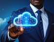 © Silver - A man in a dark blue suit points at a glowing cloud icon against a blurred sky, symbolizing technology, innovation, and connection
