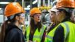 © Sonita - A diverse group of women engineers discussing new technologies.