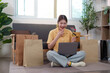 © Natee Meepian - Online shopping. Woman enjoying her shopping experience with laptop and credit card.