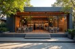 © miss irine - Minimalist coffee shop exterior in bright daylight. Sleek uncluttered design, contemporary furniture. Inviting, tranquil atmosphere with elegant stylish sunlit decor. Roomy neat relaxation space on