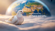 © shadeaatoine - A white dove resting on sand with a globe in the background, symbolizing International Day of Peace and Unity