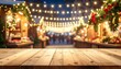 © in_uttttt - Christmas market stall with lights and wreaths, blurred background, open foreground for product