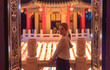 © LT - asian woman visit the chinese style temple with the hanging lanterns background in taiwan