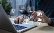 © Father_Studio - E-Library and E-Learning concept with person using laptop and virtual e-book icons, accessing digital library, online knowledge base, internet courses, and webinar technology