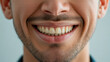 © yema - Close-up of a man's smiling face showing teeth and beard