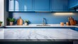 © Ina - empty white marble counter top in modern kitchen blue color with blurred background high quality photo