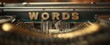 © IKM - The Typewriter Close-Up Showing Vintage Metal Typebars Spelling the Word 'WORDS'