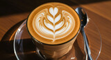Artistic Latte Reveal Exquisite Leaf Pattern Delightfully Served on a Sleek Glass