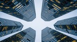Looking Up At Tall Office Buildings From Below