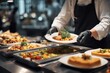 © diamondiusis - Canteen worker serving buffet meal