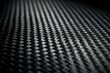 © Harry - Close-up of dark woven carbon fiber