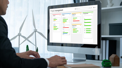 Wall Mural - Project planning software for brisk business project management on the computer screen showing timeline chart of the team project