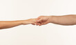 © serhii - male and female palms touching, holding each other