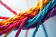 © Jame - Vibrant colored threads tightly interwoven, creating a strong, unified image symbolizing connection and unity Perfect for concepts of teamwork, collaboration, and togetherness , fabric, visual