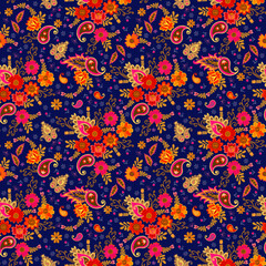 Wall Mural - Seamless pattern with bright paisley and flowers on a dark blue background in folk design. Indian motifs. Festive colorful print for fabric.