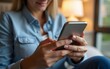 © fu - Woman typing email on smartphone. High quality
