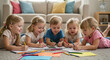 © Tamaras Pictures 4U - Five children drawing with crayons on the floor in a cozy living room