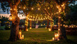 © Fawitra - Outdoor wedding reception with string lights and candles illuminating the trees and tables.