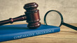© MohamadFaizal - A gavel and magnifying glass on a book titled 'COMPARATIVE NEGLIGENCE,' symbolizing a legal investigation.