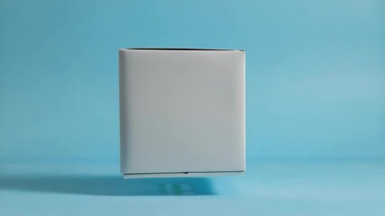 White block on blue surface.
