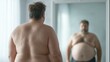 © Tina - A middle-aged Caucasian man stands in front of a mirror, observing his reflection. He has short brown hair and a stocky build, with visible body weight.
